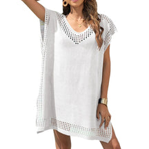 Robe de plage ample, légère et fluide, idéale pour un look chic et confortable lors des journées ensoleillées à la plage.